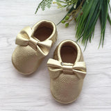 Bow Gold Leather Moccasins